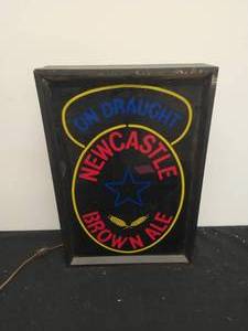 lot 107 image: Newcastle lighted sign
