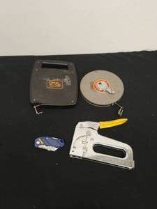 lot 120 image: Two Vintage Measuring Tapes, Heavy Duty Stapler, and Cutting Blade