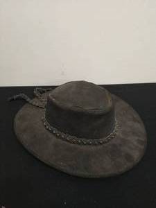 lot 122 image: Black suede hat with braided rim
