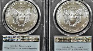 lot 903 image: Set of (2) Consecutively Numbered Silver Eagles - Perfect MS 70 PGCS Grading, First Strike