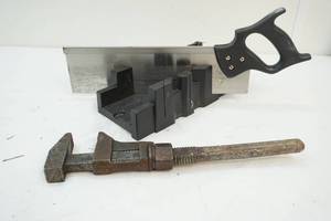 Miter box, saw, pipe wrench