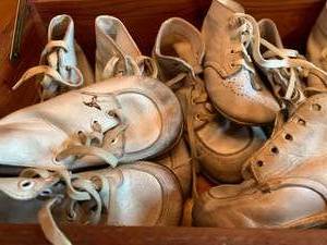 Cedar chest full of antique baby shoes