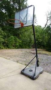 Huffy Sports --Center Court Weighted On Bottom Basket Ball System