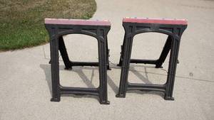 Two Hard Plastic Folding Saw Horses--32  x  22