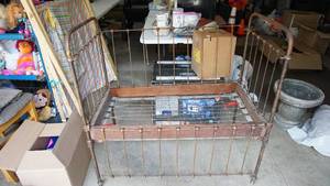 Antique Iron Crib With Some Wood & A Metal Box Spring On Wheels