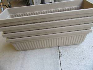 Four Hard Plastic Oblong Flower Pots