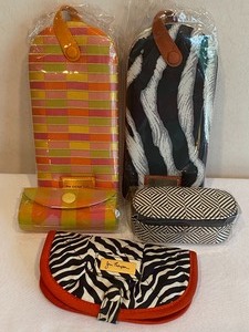 lot 127 image: Five Cosmetic and Jewelry Bags by Jim Thompson