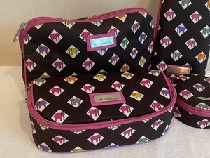 lot 125 image: Set of Four Coordinating Cosmetic & Jewelry Bags by Jim Thomson