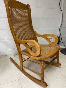 lot 228 image: Wooden and Caned Rocking Chair