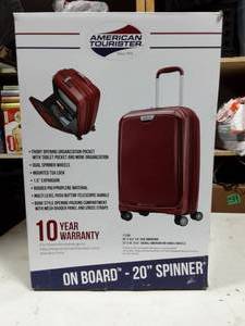 lot 11 image: American Tourister 20 Spinner Carry-On Luggage