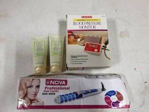 lot 14 image: Blood Pressure Monitor, 2-NEW Mary K Satin Hands, Nova Hair Curler