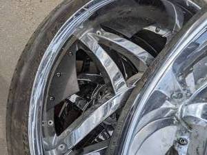 lot 154 image: Four Pirelli Tires & Rims