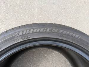 lot 156 image: One Bridgestone Tire, Dueler HP Sport