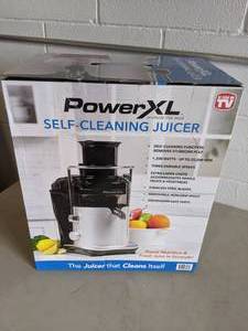 lot 127 image: PowerXL 6-Oz. 1200-Watt Self-Cleaning Juicer 