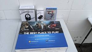 lot 17 image: Sony PlayStation 4 with Stereo Headphones, Dual Charging Dock, NBA2K21