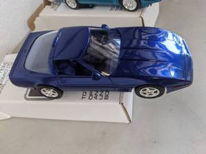 lot 216 image: Four AMT ERTL Collectible Cars (Corvette)