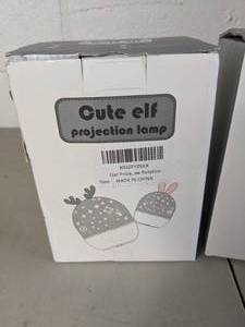 lot 215 image: Cute Elf Brand Star Projection Rotating LampNightlight Deer with Remote