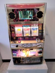 lot 149 image: Tomb Raider Slot Machine, Metal Cabinet