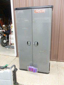 lot 7 image: Craftsman metal 3 shelf cabinet. Door has storage shelves. Used condition. Has a few scratches & dents. As shown.