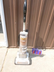 lot 18 image: Electrolux precision vacuum. Used condition. Vacuum works but appears to need a belt replaced. As shown.