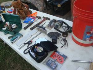 Air grip laser level, propane torch kit, Handy driver set, leather tool belts wnails, cement chisels