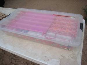 Tote of gift bags and wrapping paper