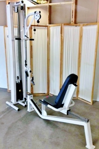 lot 6 image: WOW ENDORPHIN WALL MOUNT PHYSICAL THERAPY WEIGHT TRAINING PULLEY MACHINE & INCLINE UTILITY BENCH - GREAT CONDITION SEE PICTURES FOR ALL THAT IS INCLUDED Looks to be missing pulley bar handle...can be purchased online $25