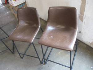 2 Barstools- seats are 2 ft high...
