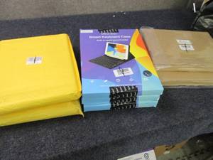 lot 28 image: 7 Assorted Keyboard Cases...
