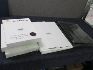 lot 40 image: Assorted Sleeves & Cases...