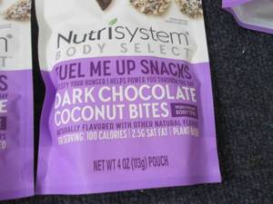 lot 85 image: 6- 4 oz Bags Nutrisystem Dark Choco...