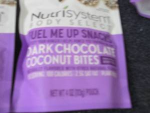 lot 87 image: 6- 4 oz Bags Nutrisystem Dark Choco...