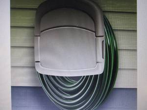 lot 126 image: Garden Hose Storage Center open box...