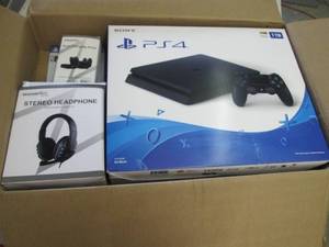 lot 196 image: PlayStation 4 Slim Black 1TB Bundle...