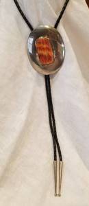 lot 45 image: Southwestern Sawtooth Bezel Bolo Tie