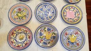 lot 22 image: Reinaldo Sanguino Ceramic Plates, set of 9
