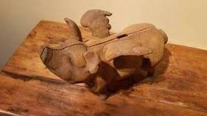 lot 84 image: Iron Flying Pig Piggy Bank