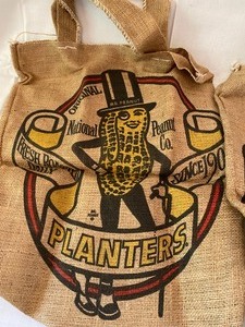 lot 136 image: Vintage Burlap Planters Peanuts Handled Bags