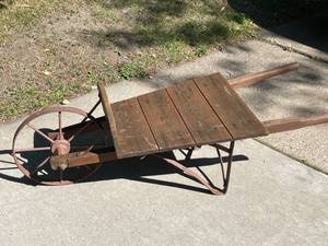 lot 303 image: Rolling Garden Cart With Metal Wheel