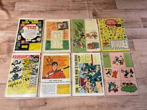 lot 259 image: 8 Disney Comic Books