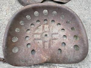 lot 390 image: 2 Rusty Vintage Tractor Seats
