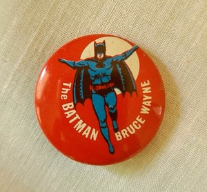 lot 101 image: Collectible Batman and Robin Pinbacks