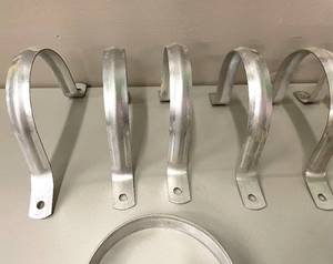Lot of 12 Aluminum 4 Pipe Brackets.&nbsp Used.&nbsp