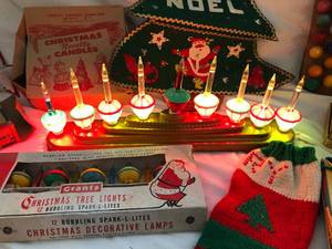 lot 108 image: Vintage Christmas Lights, Menorah, Tree Toppers and Tinsel