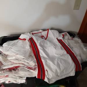 Box Full of QGene Jeans Co. V-Neck ...