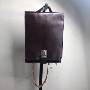 lot 22 image: Vintage Brown Crossbody Bag With Key