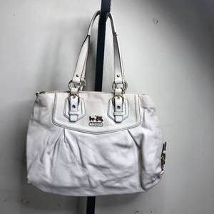 lot 34 image: White Coach Purse