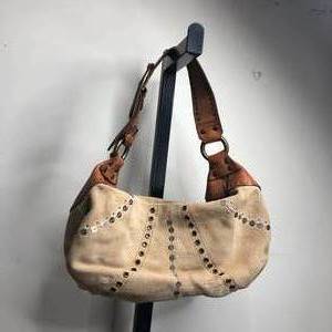 lot 51 image: Tan Designed Fossil Handbag