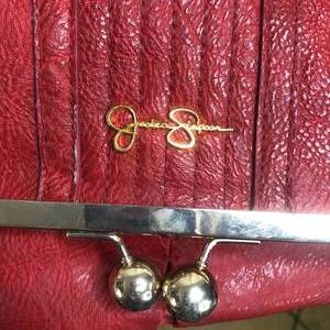 lot 65 image: Red Jessica Simpson Crossbody Purse