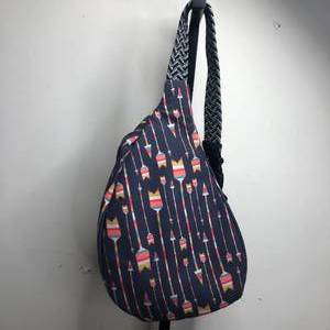 lot 66 image: Ambry Arrow Swing Backpack
